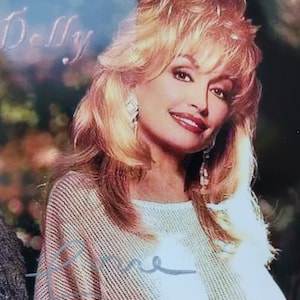 christina buce recommends dolly parton boobs naked pic